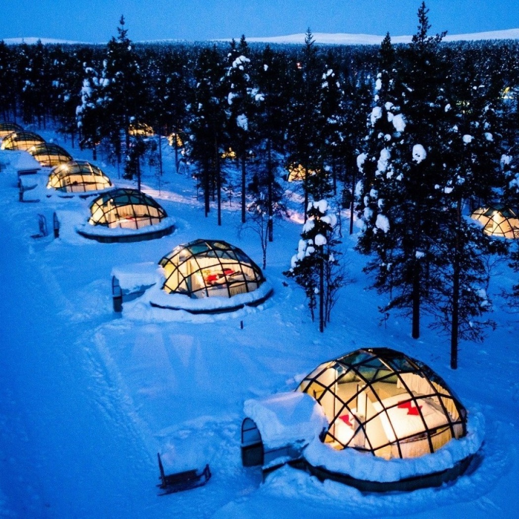 see the northern lights and holiday in the snow and ice at the Kakslauttanen Artic Resort